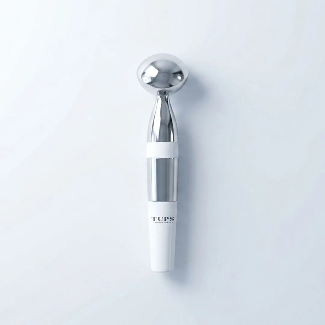 イオンフィット美顔器。金属のヘッドと白いボディ